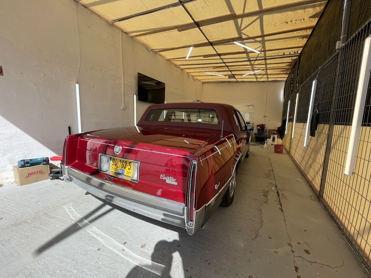 Water beading on a ceramic coated car hood